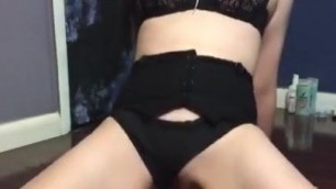 Girl masturbating in lingerie dildo.